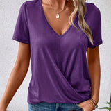Lianna™ - T-shirt à col en V avec ourlet twisté